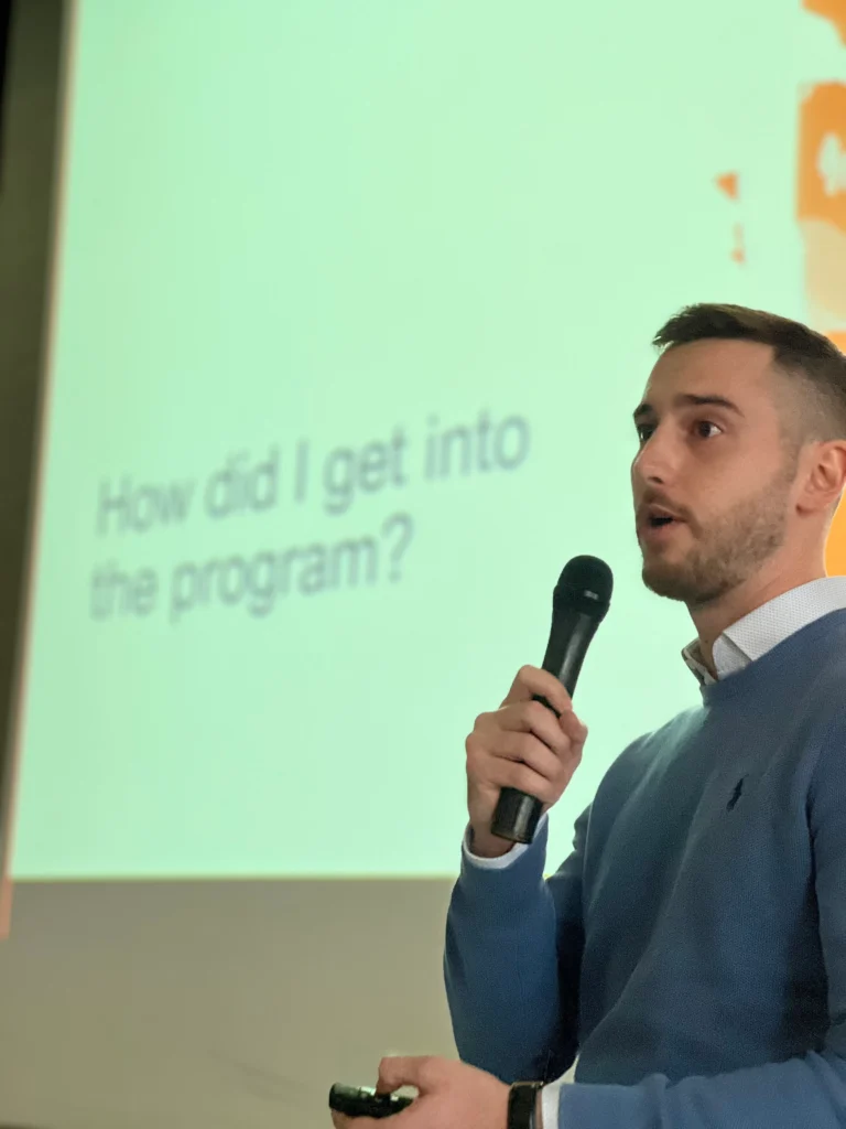 Cyntegrity team member presenting career opportunities and program pathways during a company recruitment event.